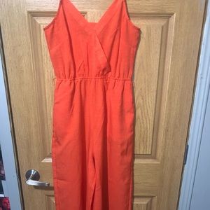 this is a coral colored jumpsuit very light weight perfect for summer